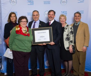 From left, Madelyn Ross; Judith Green, President Angel Cabrera, Solon Simmons, Rita Rowand and Dann Sklarew accept the Simon Spotlight Award. Photo Courtesy Office of Global Strategy.