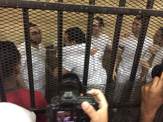 Aya Hijazi in cage with husband